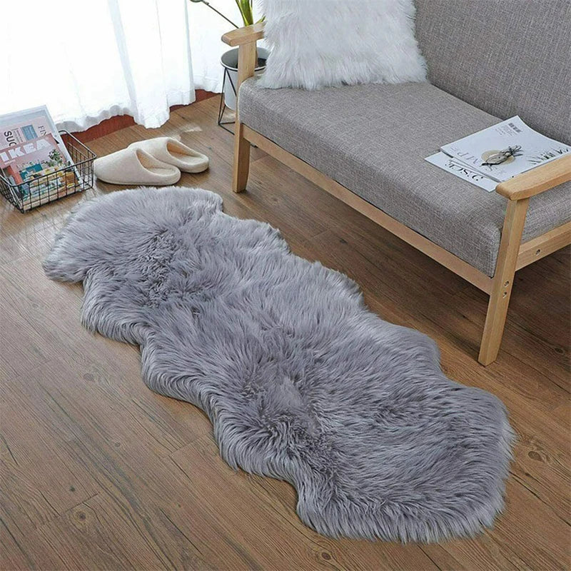 Soft and fluffy imitation sheepskin rug luxurious for bedroom or living room.