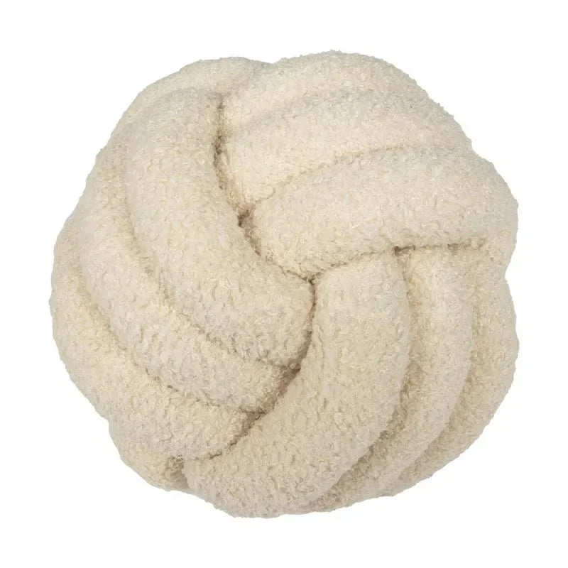 Decorative plush pillow with an aesthetically pleasing globe-shaped knot, ideal for sleeping