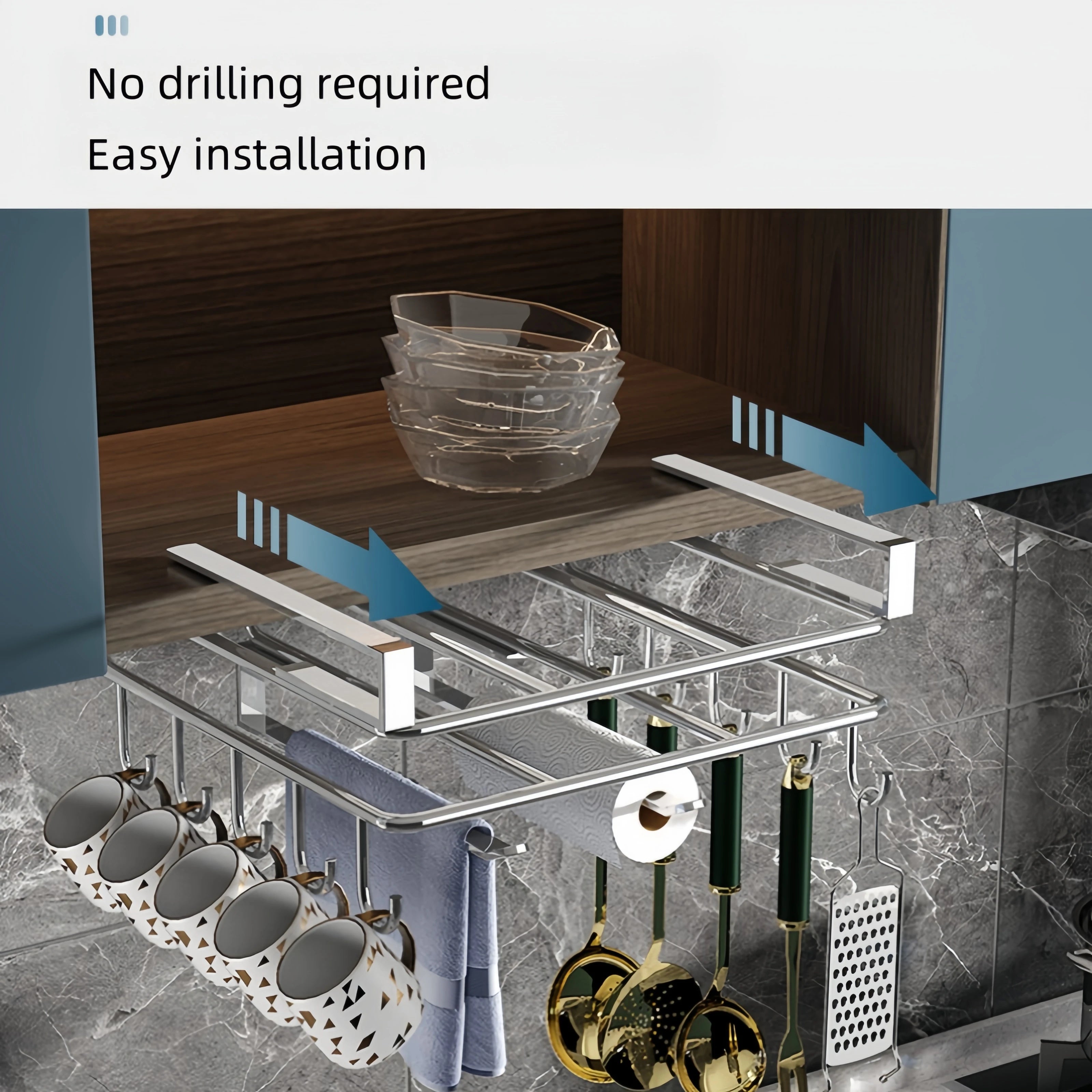 Stainless steel hanging kitchen rack with hooks for paper towels, utensils, and cutting board.