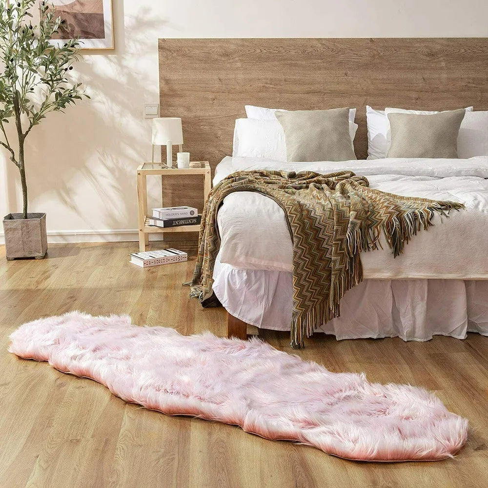 Soft and fluffy imitation sheepskin rug luxurious for bedroom or living room.