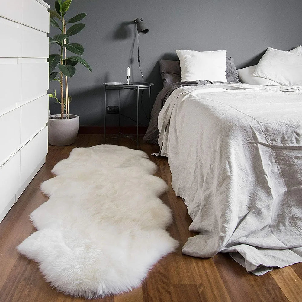 Soft and fluffy imitation sheepskin rug luxurious for bedroom or living room.