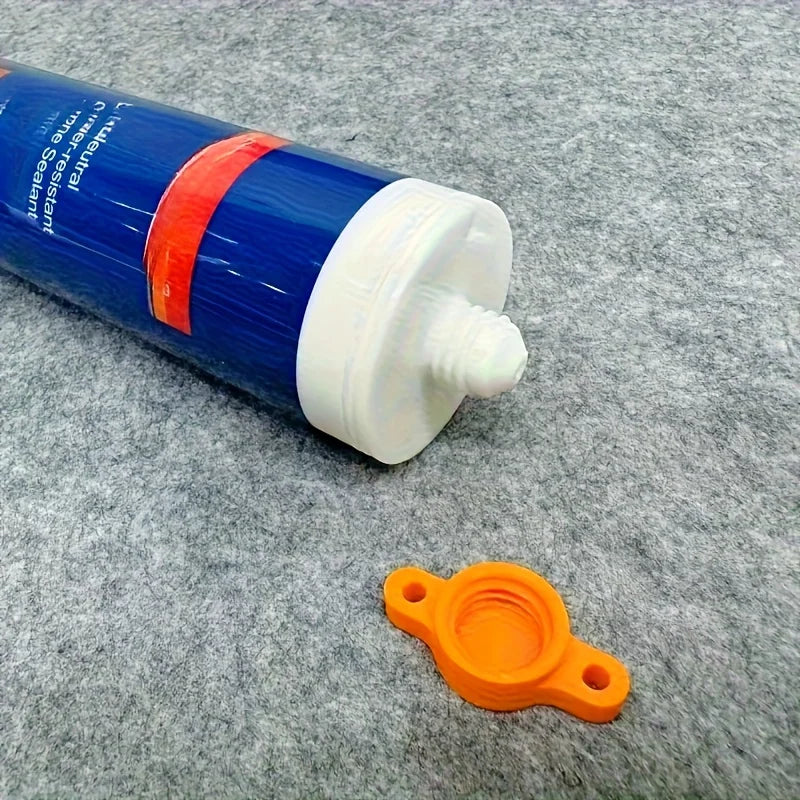 Silicone seal cap and seal gun nozzle removal tool