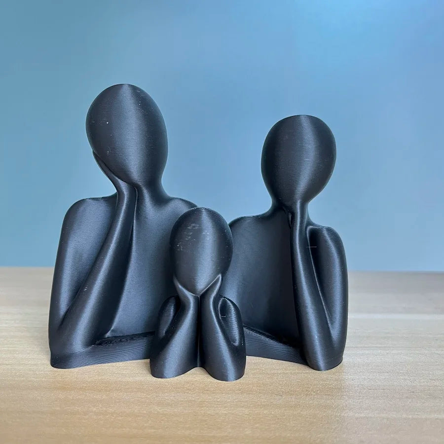 A family decorated wedding statue for three people -  perfect as an anniversary