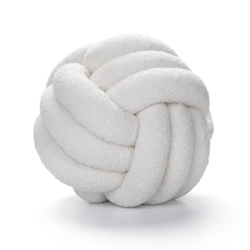 Decorative plush pillow with an aesthetically pleasing globe-shaped knot, ideal for sleeping