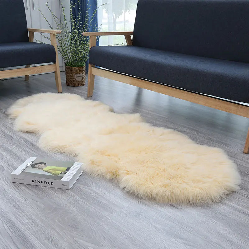 Soft and fluffy imitation sheepskin rug luxurious for bedroom or living room.
