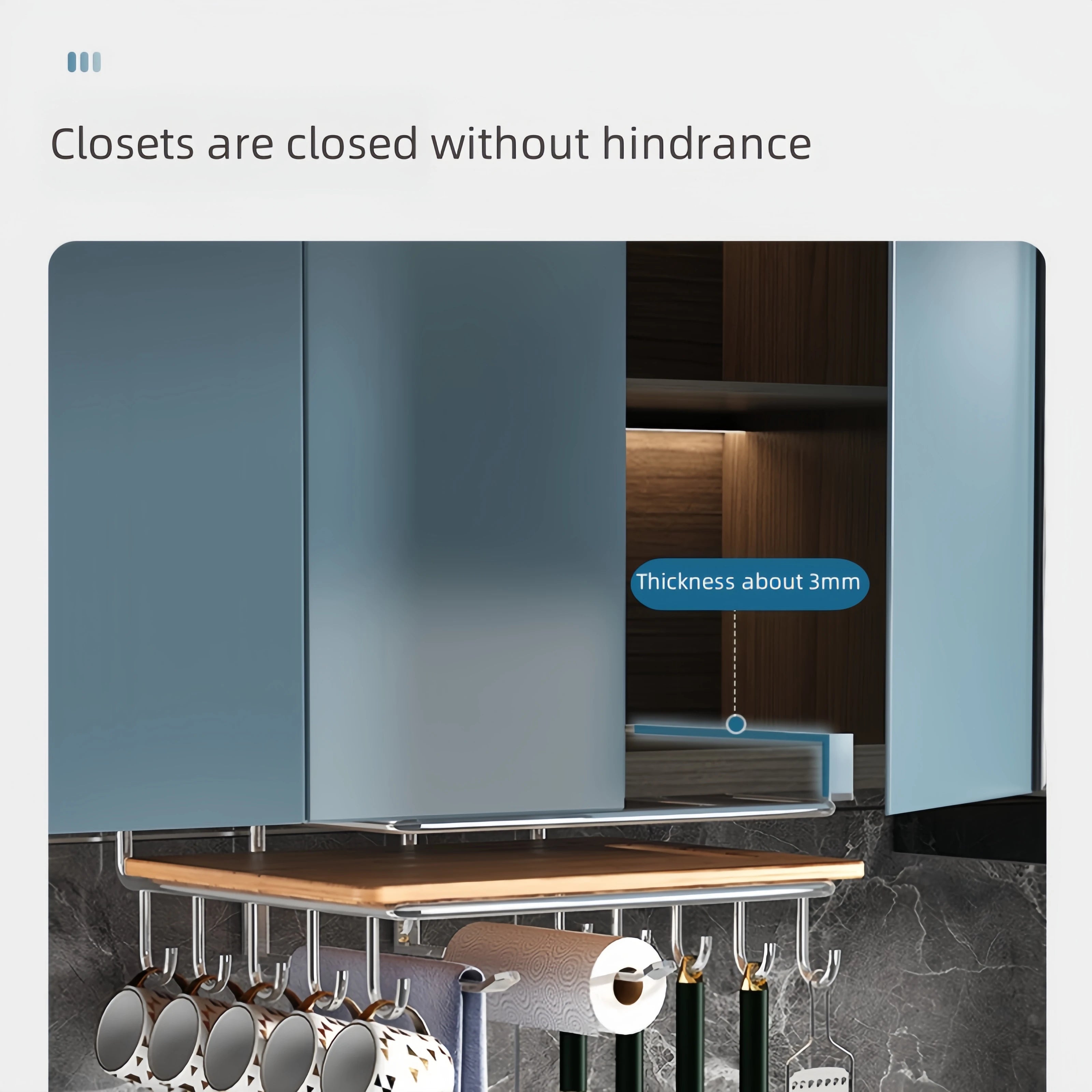 Stainless steel hanging kitchen rack with hooks for paper towels, utensils, and cutting board.