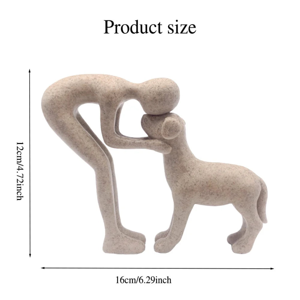 Resin figurine of a puppy and its owner - table ornament interior decoration model.